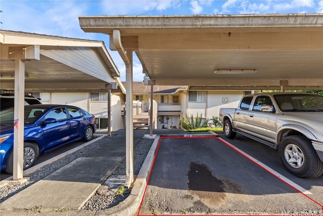 view of parking featuring a carport