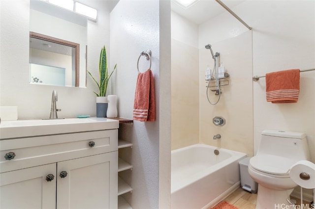 full bathroom featuring vanity, toilet, bathtub / shower combination, and hardwood / wood-style floors