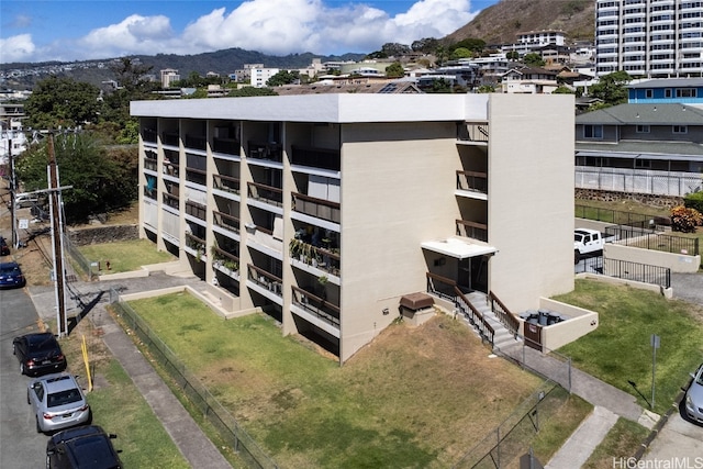 view of building exterior with a mountain view