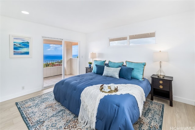 bedroom with light hardwood / wood-style floors