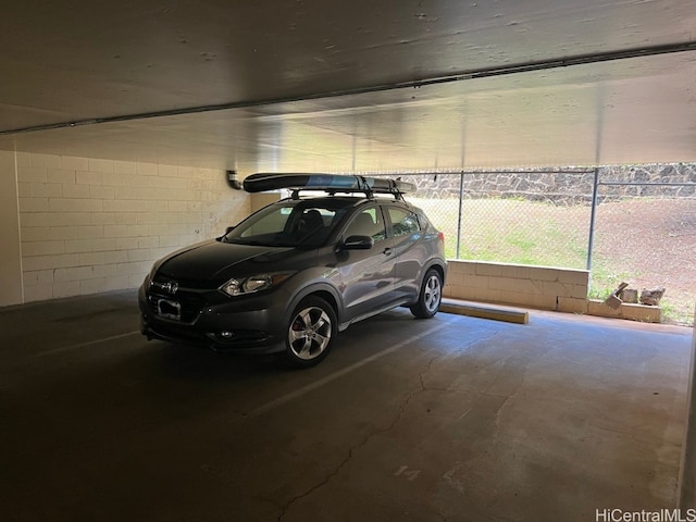 garage with a carport