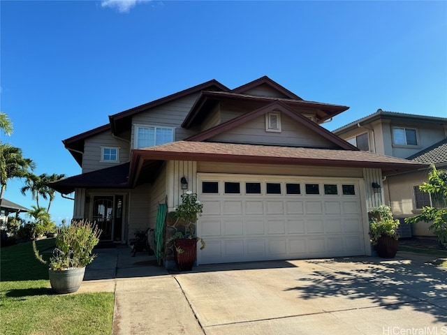 view of front of property with a garage