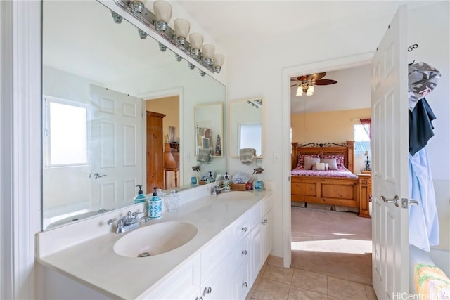 bathroom with ceiling fan, vanity, and tile patterned flooring