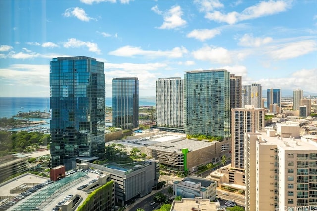 property's view of city featuring a water view