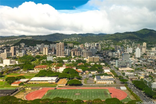 birds eye view of property featuring a mountain view