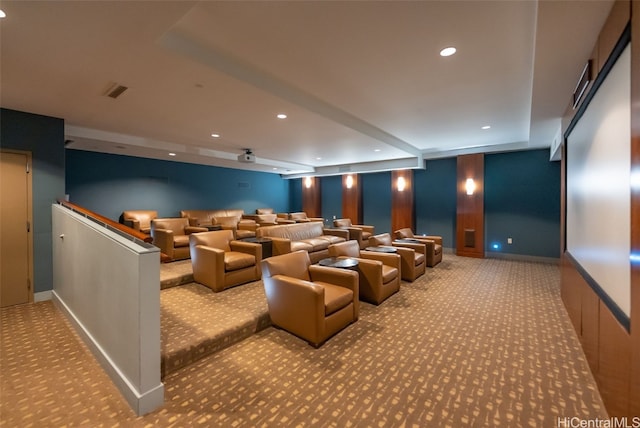 home theater room featuring light carpet