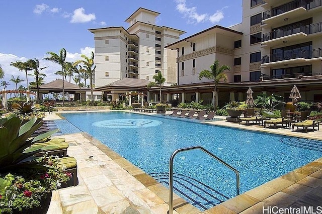 pool featuring a patio area