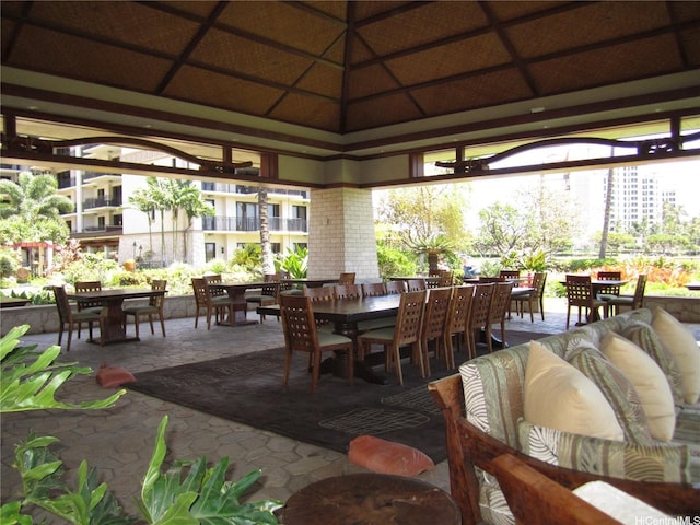 view of patio / terrace featuring a gazebo, outdoor dining area, and an outdoor living space