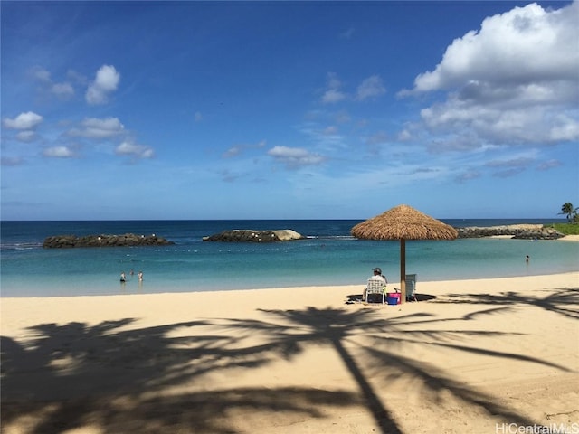 property view of water featuring a view of the beach