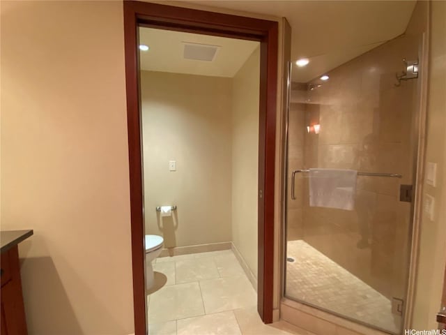 bathroom with toilet, a stall shower, baseboards, recessed lighting, and tile patterned flooring
