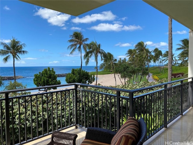 balcony featuring a water view