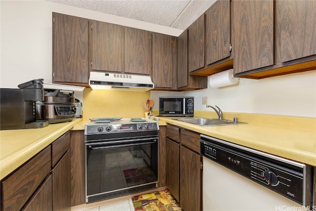 kitchen with sink, black appliances, dark brown cabinets, and a textured ceiling