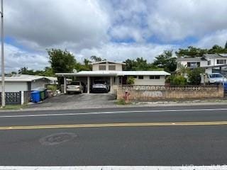 view of front facade featuring a carport