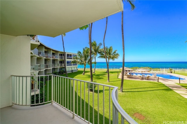 balcony featuring a water view