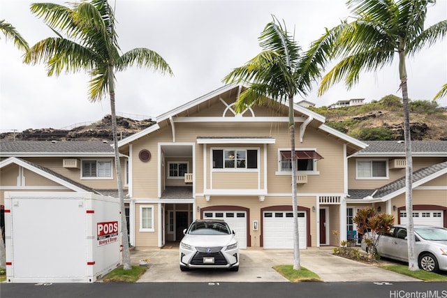 view of front of property featuring a garage