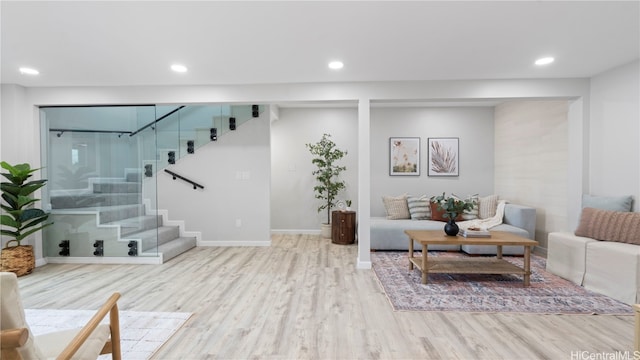 living room with light hardwood / wood-style floors