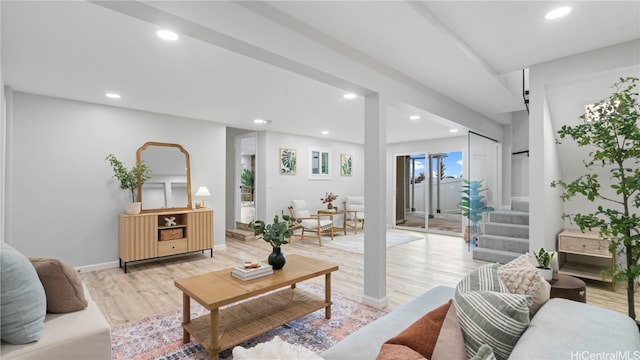 living room with light hardwood / wood-style flooring