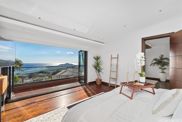 bedroom with dark wood-type flooring