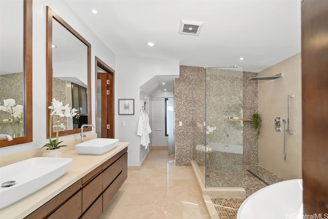 bathroom featuring vanity and plus walk in shower