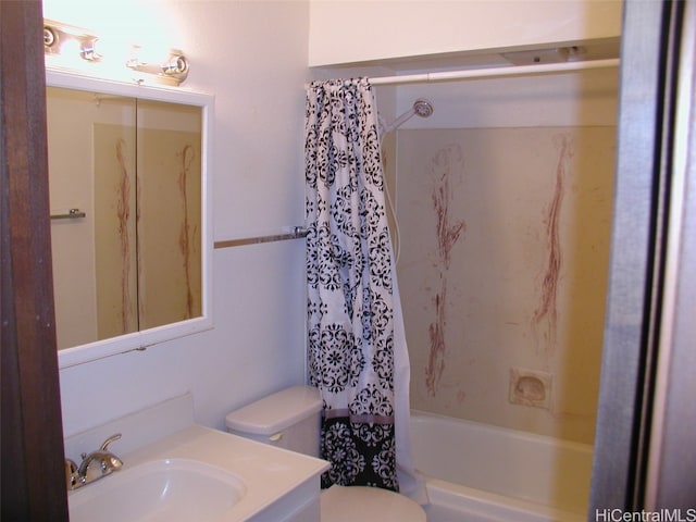 full bathroom featuring vanity, toilet, and shower / bath combo with shower curtain