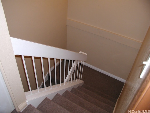 staircase with carpet