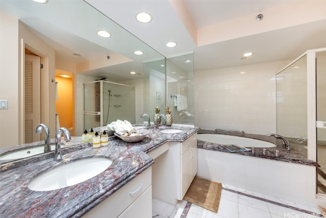 bathroom featuring vanity and plus walk in shower