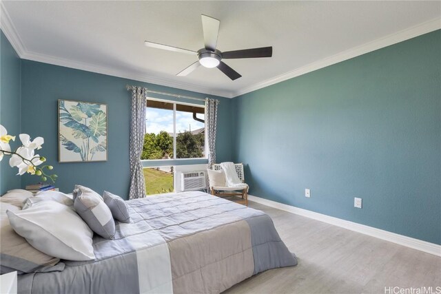 bedroom with hardwood / wood-style floors, ornamental molding, an AC wall unit, and ceiling fan