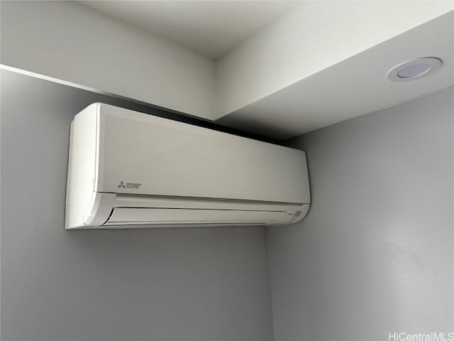 interior details with a wall mounted air conditioner