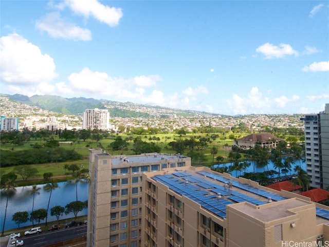 exterior space featuring a water and mountain view