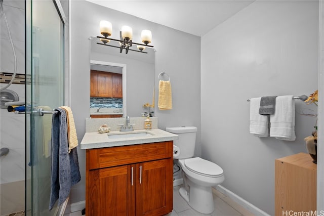 bathroom with tile patterned flooring, vanity, toilet, and an enclosed shower