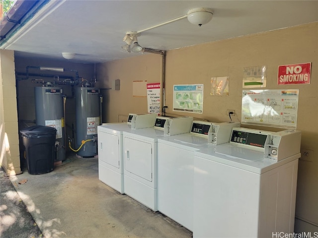 laundry area featuring washer and clothes dryer and water heater