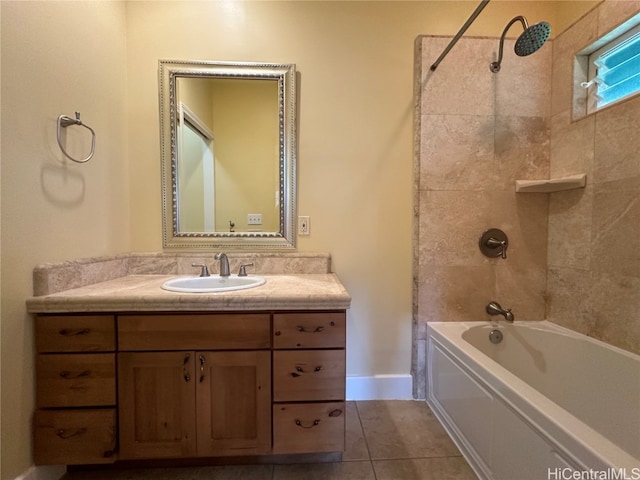 bathroom with vanity, tiled shower / bath combo, and tile patterned floors