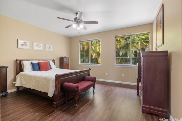 bedroom with dark wood-type flooring and ceiling fan