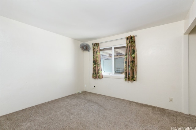 empty room featuring carpet flooring