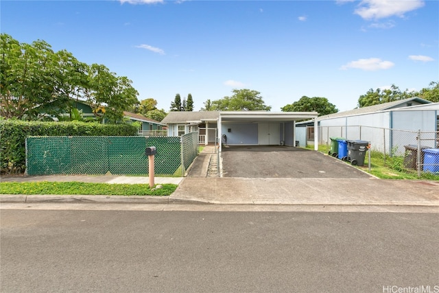 view of front of house featuring a carport