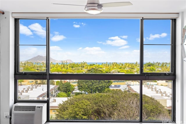 details featuring a mountain view and ceiling fan