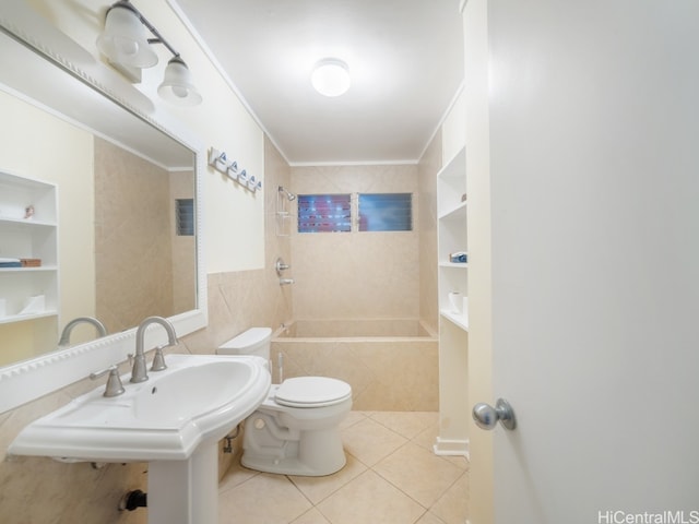 bathroom featuring toilet, tiled shower / bath combo, tile patterned floors, and built in shelves