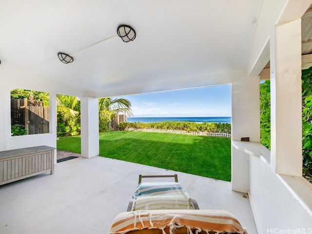 view of patio with a water view