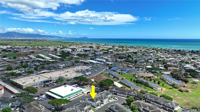 birds eye view of property featuring a water and mountain view