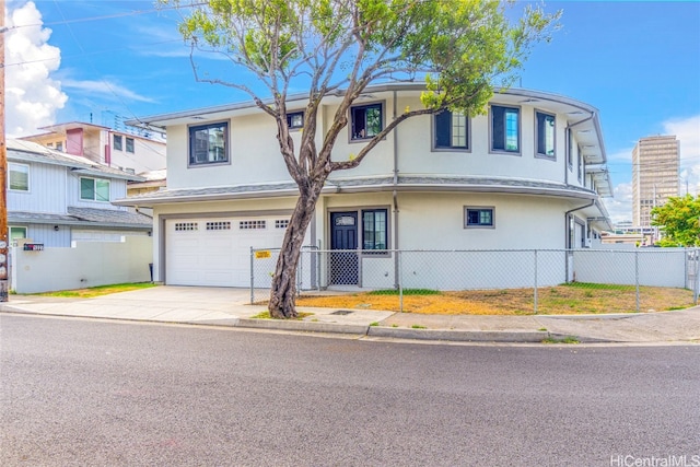 multi unit property featuring a garage