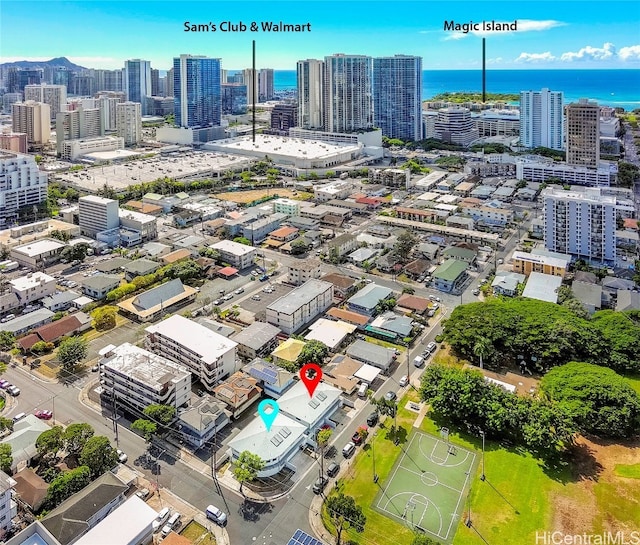 drone / aerial view with a water view