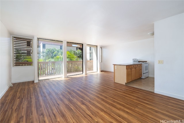 unfurnished living room featuring light hardwood / wood-style floors