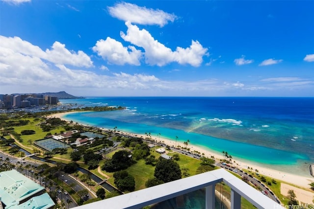 exterior space featuring a view of the beach and a water view