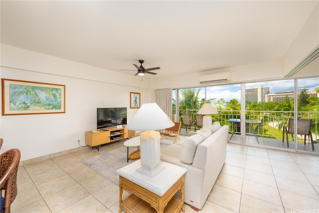 living room featuring a wall mounted air conditioner, a ceiling fan, and light tile patterned floors