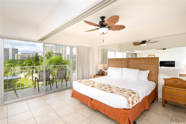 bedroom featuring light tile patterned floors, access to outside, a ceiling fan, and multiple windows