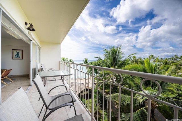 balcony featuring a water view