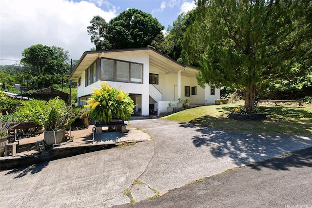 2630 Waiomao Rd, Honolulu, HI 96816 - view of front of house with stairway and aphalt driveway