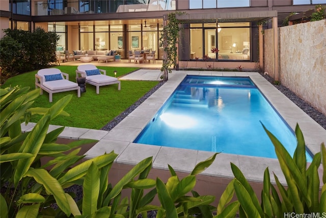 view of pool featuring a patio and an outdoor hangout area