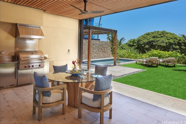 view of patio / terrace featuring area for grilling and ceiling fan