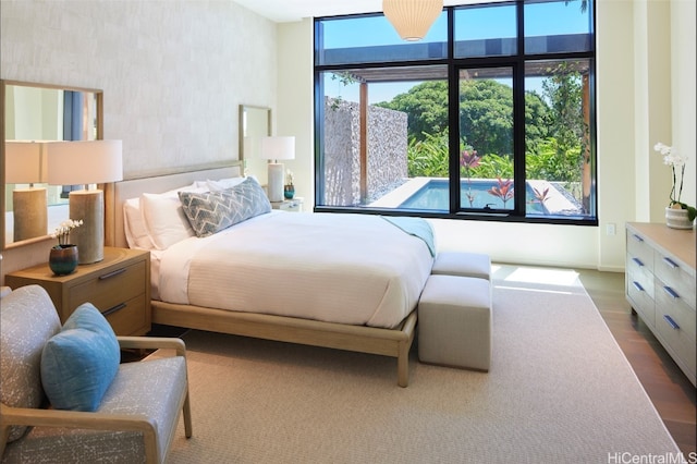 bedroom featuring hardwood / wood-style floors